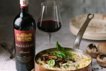 Creamy mushroom & spinach risotto – prepared with Roodeberg Classic Rosé and enjoyed with Roodeberg Reserve